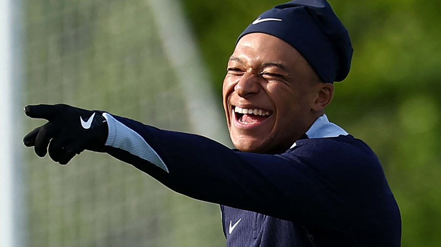 Getty Images - France's forward Kylian Mbappe reacts during a training session, as part of the team's preparation for upcoming UEFA Euro 2024 Football Championship, in Clairefontaine-en-Yvelines on May 30, 2024. The UEFA Euro 2024 championship will take place from June 14 to July 14, 2024 in Germany. (Photo by FRANCK FIFE / AFP) (Photo by FRANCK FIFE/AFP via Getty Images)