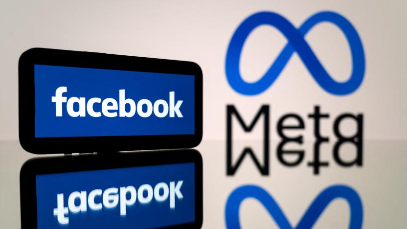 This picture taken on January 12, 2023 in Toulouse, southwestern France shows a smartphone and a computer screen displaying the logos of the social network Facebook and its parent company Meta. (Photo by Lionel BONAVENTURE / AFP) (Photo by LIONEL BONAVENTURE/AFP via Getty Images)