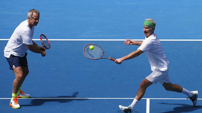 Tennis - Australian Open - Melbourne Park, Melbourne, Australia - 21/1/17 John McEnroe hits the ball, next to his brother Patrick McEnroe during their Australian Open Legends match event. REUTERS/David Gray