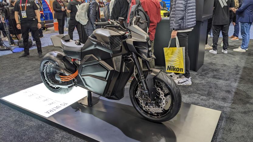 a black electric motorcycle with a hubless rear wheel