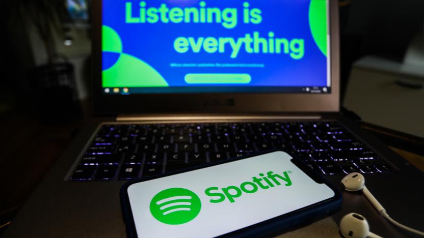 Spotify logo displayed on a phone screen and Spotify website displayed on a laptop screen are seen in this illustration photo taken in Poland on October 18, 2020. 
 (Photo Illustration by Jakub Porzycki/NurPhoto via Getty Images)