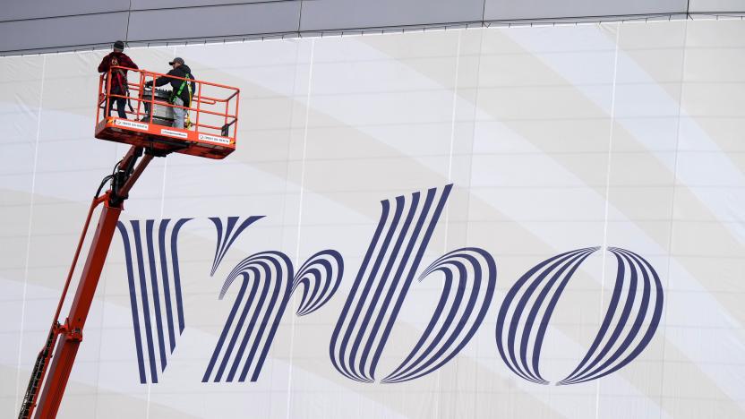 Dec 30, 2022; Glendale AZ, USA; Workers place Vrbo signage on the exterior of State Farm Stadium, the site of the 2022 CFP Semifinal between the TCU Horned Frogs and the Michigan Wolverines and Super Bowl 57 (LVII). Mandatory Credit: Kirby Lee-USA TODAY Sports