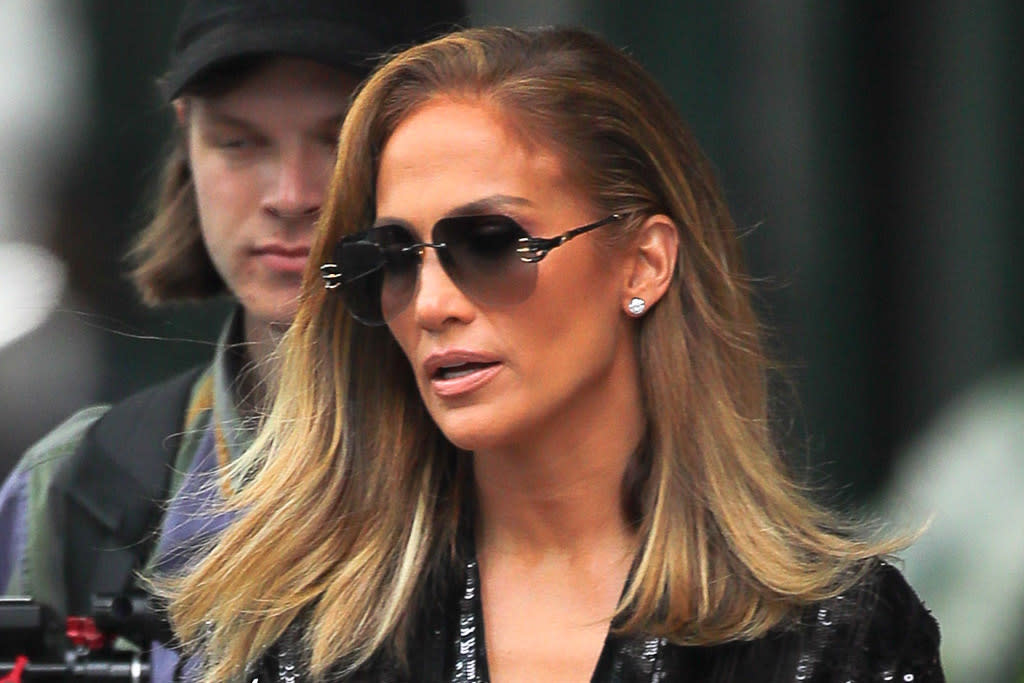 J-Lo flies to DC for the opening with bold pants that camouflage inside his boots
