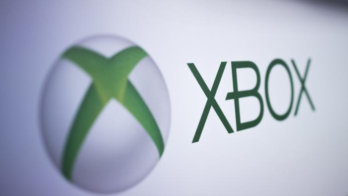 FILE - The Xbox logo is pictured at the Paris Games Week in Paris, Nov. 3, 2017. Several exclusive Xbox games will be soon making their way to rival consoles, the video gaming brand and its parent company Microsoft announced Thursday, Feb. 15, 2024. (AP Photo/Kamil Zihnioglu, File)