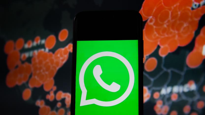 POLAND - 2020/03/19: In this photo illustration a WhatsApp logo seen displayed on a smartphone with a World map of COVID 19 epidemic on the background. (Photo Illustration by Omar Marques/SOPA Images/LightRocket via Getty Images)