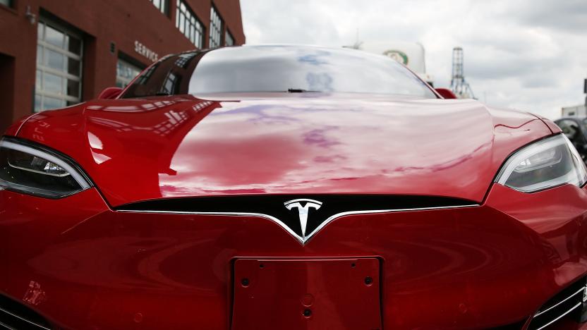 NEW YORK, NY - JULY 05:  A Tesla model S sits parked outside of a new Tesla showroom and service center in Red Hook, Brooklyn on July 5, 2016 in New York City. The electric car company and its CEO and founder Elon Musk have come under increasing scrutiny following a crash of one of its electric cars while using the controversial autopilot service. Joshua Brown crashed and died in Florida on May 7 in a Tesla car that was operating on autopilot, which means that Brown's hands were not on the steering wheel.  (Photo by Spencer Platt/Getty Images)