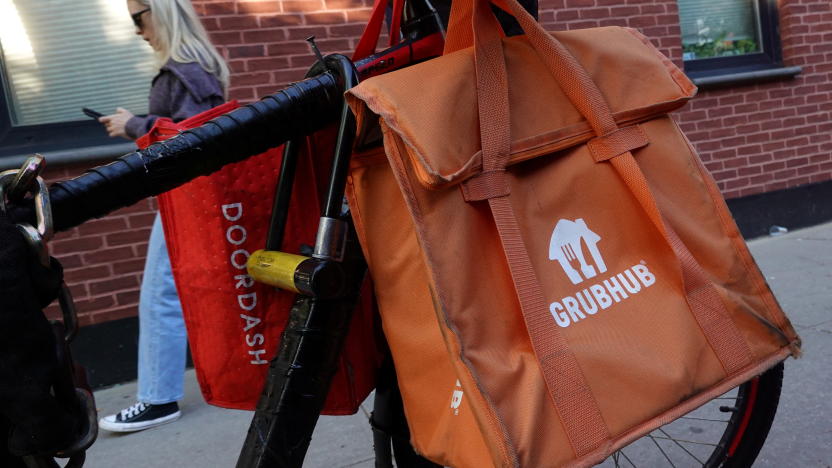 Doordash and Grubhub delivery bags are seen on a bicycle in Brooklyn, New York City, U.S., May 9, 2022. REUTERS/Andrew Kelly