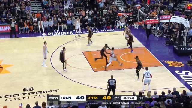 Deandre Ayton with a block vs the Denver Nuggets