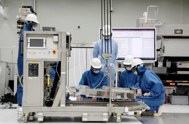 Trainees learn how to build and operate an EUV machine at the training center at ASML Holding in Tainan, Taiwan, August 20, 2020. REUTERS/Ann Wang