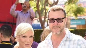 Tori Spelling says she is sleeping in a room with her kids, not with husband Dean McDermott