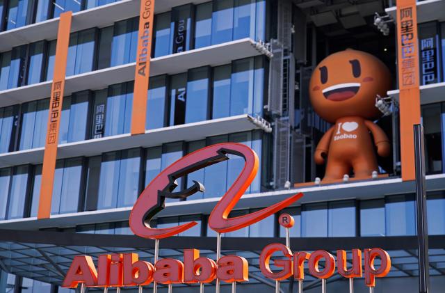 The Alibaba Group logo is seen during the company's 11.11 Singles' Day global shopping festival at their headquarters in Hangzhou, Zhejiang province, China, November 11, 2020. REUTERS/Aly Song