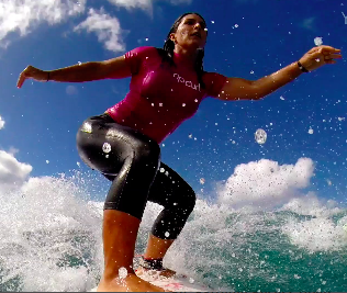 What I Learned Surfing In Hawaii With The First Hindu Congresswoman