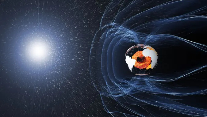 A depiction of Earth's magnetic field, protecting the planet from cosmic radiation and charged particles that bombard Earth in solar winds.