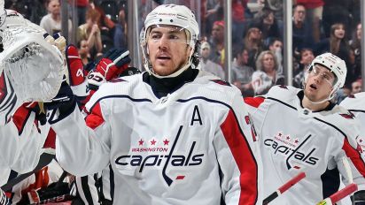 Getty Images - PHILADELPHIA, PENNSYLVANIA - APRIL 16: T.J. Oshie #77 of the Washington Capitals celebrates his third period empty-net goal against the Philadelphia Flyers with his teammates on the bench at the Wells Fargo Center on April 16, 2024 in Philadelphia, Pennsylvania. With tonight's win, the Capitals have reached the NHL playoffs. (Photo by Len Redkoles/NHLI via Getty Images)