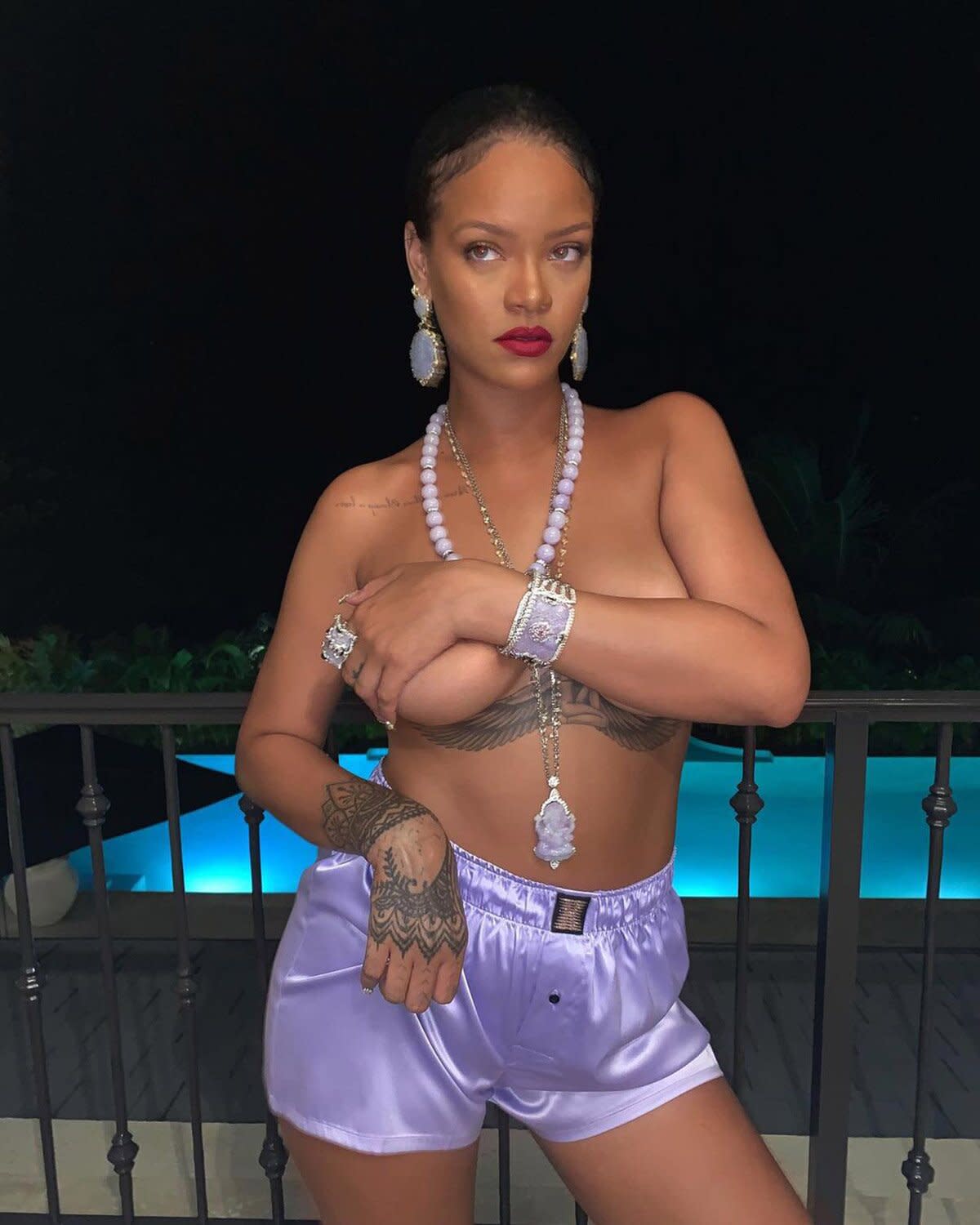 Rihanna Poses Topless In Purple Savage X Fenty Boxers For Sexy Poolside Snap