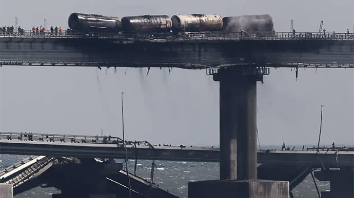 The Crimean bridge is guarded by fighter jets from the sky, and by divers and fi..