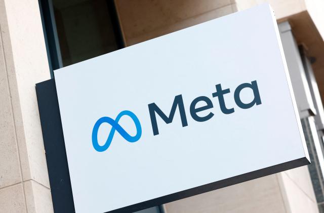 The logo of Meta Platforms' business group is seen in Brussels, Belgium December 6, 2022. REUTERS/Yves Herman