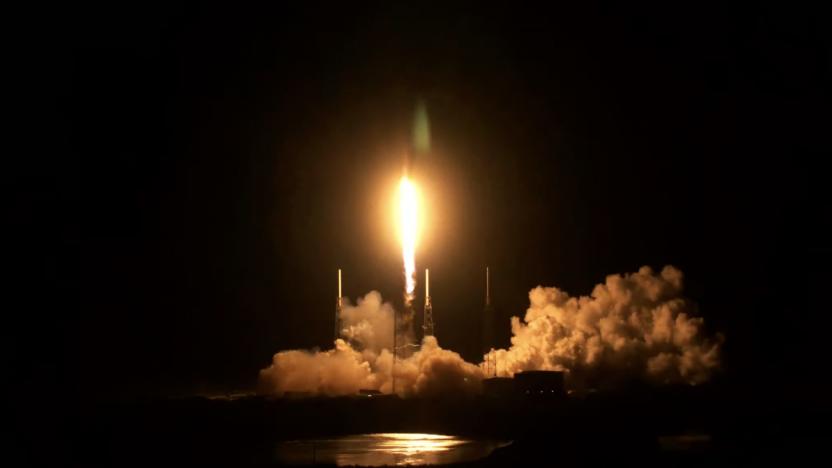 The NASA TEMPO launch seen at night from a distance, with the rocket blazing as it takes off.