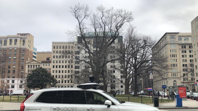 An Uber car equipped with cameras and sensors drives the streets of Washington, DC, on January 24, 2020. - Uber Advanced Technologies Group (ATG) announced it would begin data collection for self-driving vehicles on Washington, DC, roads beginning January 24. ATG self-driving vehicles - operated by two human drivers, better known as Mission Specialists - will collect road data to support the development of Ubers self-driving vehicle technology. (Photo by Eric BARADAT / AFP) (Photo by ERIC BARADAT/AFP via Getty Images)