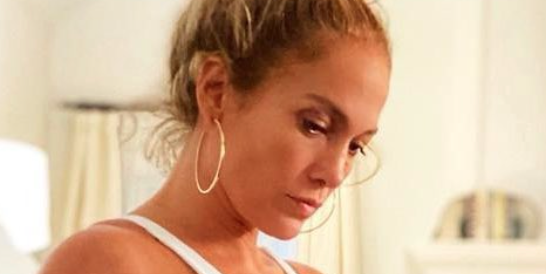 J Lo Looks Impossibly Stunning In A One Piece White Swimsuit