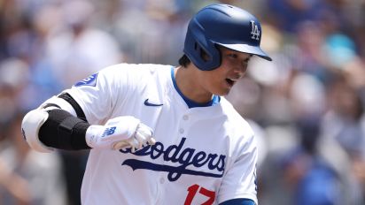 Yahoo Sports - Ohtani tagged Braves ace Max Fried for a two-run shot in the first inning then hit a solo shot in the eighth as the Dodgers prevailed in a battle of NL