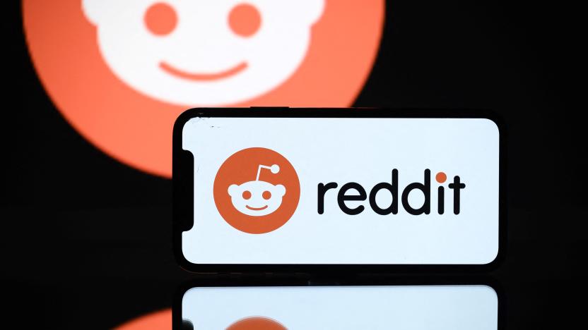 A picture taken on October 5, 2021 in Toulouse shows the logo of Reddit social media displayed by a by a tablet and a smartphone. (Photo by Lionel BONAVENTURE / AFP) (Photo by LIONEL BONAVENTURE/AFP via Getty Images)