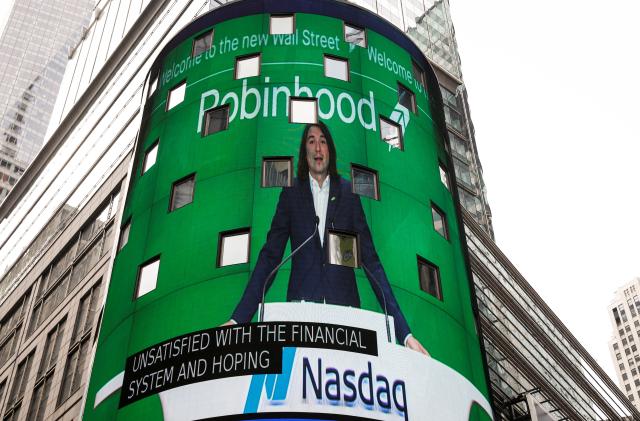 Vlad Tenev, CEO and co-founder Robinhood Markets, Inc., is displayed on a screen during his company’s IPO at the Nasdaq Market site in Times Square in New York City, U.S., July 29, 2021.  REUTERS/Brendan McDermid