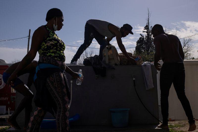 Biden heeds complaints, lifts refugee cap to 62,500