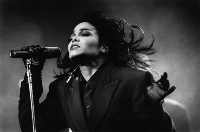 NETHERLANDS - 4th OCTOBER: American singer Janet Jackson performs live on stage at Ahoy in Rotterdam, Netherlands during her Rhythm Nation World tour on 4th October 1990. (Photo by Michel Linssen/Redferns)