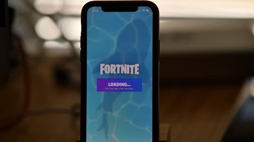 This illustration picture shows Epic Games' Fortnite loading on a smartphone in Los Angeles on August 14, 2020. - Apple and Google on August 13, 2020 pulled video game sensation Fortnite from their mobile app shops after its maker Epic Games released an update that dodges revenue sharing with the tech giants. (Photo by Chris DELMAS / AFP) (Photo by CHRIS DELMAS/AFP via Getty Images)