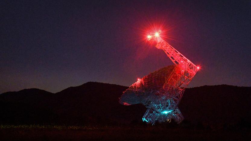 GREEN BANK, WV-JUNE 07: The Robert C. Byrd Green Bank Telescope as seen at night in Green Bank, West Virginia on June 7, 2019. Note that the array of small green dots in the lower right portion of the photo are of blinking fireflies. The Robert C. Byrd Green Bank Telescope in Green Bank, West Virginia is the world's largest fully steerable radio telescope. The telescope is taller than the Statue of Liberty and the site where the telescope sits is on a campus that can be visited by the public. (Photo by Michael S. Williamson/The Washington Post via Getty Images)