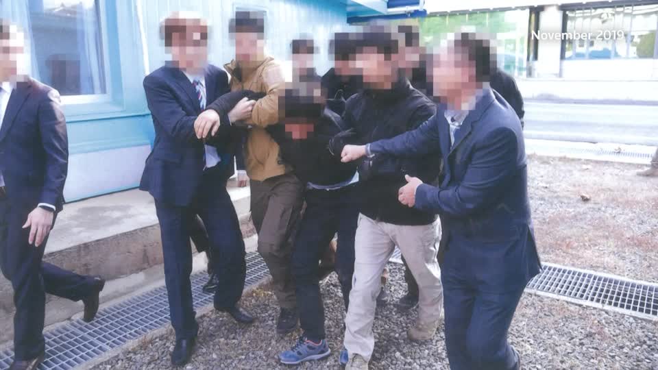 S.Korea releases photos of N.Koreans forced back