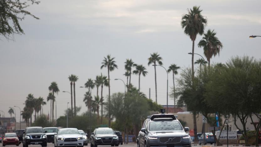 A self driving Volvo vehicle, purchased by Uber, moves along the streets of Scottsdale, Arizona, U.S., December 1, 2017.  Photo taken on December 1, 2017.  REUTERS/Natalie Behring