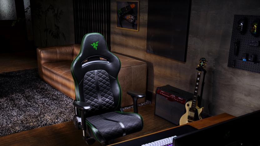 Product image of Enki in a room with a gaming desktop, guitar and couch