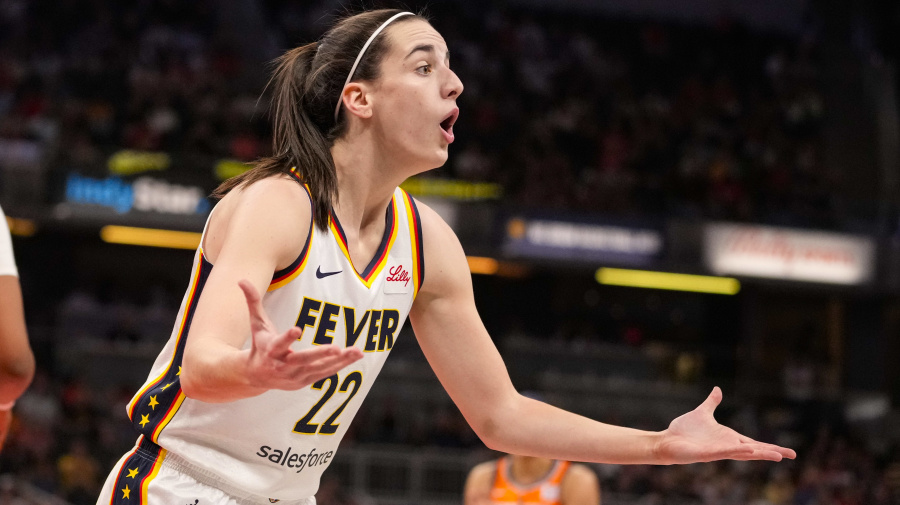 Associated Press - Indiana Fever guard Caitlin Clark (22) questions a call in the first half of a WNBA basketball game against the Connecticut Sun in Indianapolis, Monday, May 20, 2024. (AP Photo/Michael Conroy)