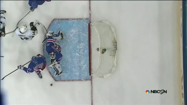 Henrik Lundqvist reacts in time for pad save