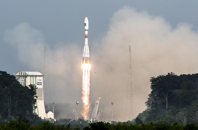 A picture taken on December 17, 2015 shows a Soyuz rocket blasting off from the European space centre at Kourou, French Guiana.

Europe was set to launch the next two satellites today for its multi-billion-euro Galileo satnav system, a rival to America's GPS, according to space firm Arianespace. / AFP / Jody AMIET        (Photo credit should read JODY AMIET/AFP via Getty Images)