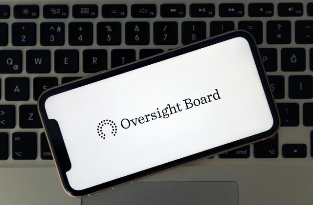 ANKARA, TURKEY - MAY 07: Oversight Board logo is seen on a smart phone in Ankara, Turkey on May 07, 2020. (Photo by Hakan Nural/Anadolu Agency via Getty Images)