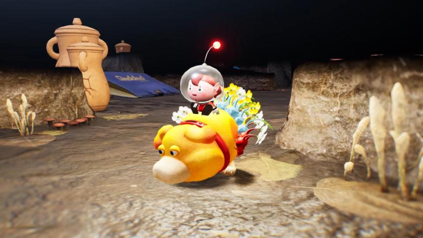 A group of plant-like Pikmin and a castaway astronaut ride on the back of a round, yellow dog in the Switch game, Pikmin 4.