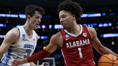 Getty Images - LOS ANGELES, CALIFORNIA - MARCH 28: Mark Sears #1 of the Alabama Crimson Tide drives against Cormac Ryan #3 of the North Carolina Tar Heels during the first half in the Sweet 16 round of the NCAA Men's Basketball Tournament at Crypto.com Arena on March 28, 2024 in Los Angeles, California. (Photo by Harry How/Getty Images)