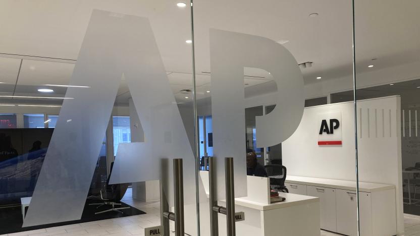 The Associated Press logo is shown at the entrance to the news organization's office in New York on Thursday, July 13, 2023. ChatGPT-maker OpenAI and The Associated Press said Thursday that they've made a deal for the artificial intelligence company to license AP's archive of news stories. (AP Photo/Aaron Jackson)