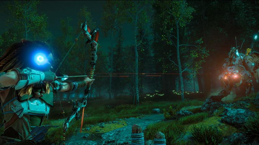 Aloy takes aim at a machine with her bow at night in Horizon Zero Dawn.