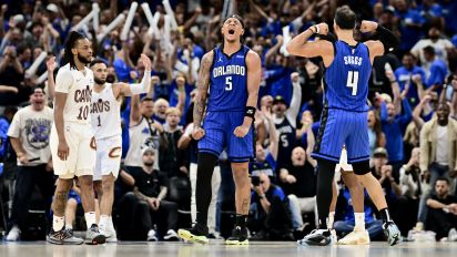 Getty Images - ORLANDO, FLORIDA - MAY 03: Paolo Banchero #5 of the Orlando Magic celebrates with Jalen Suggs #4 after a basket against the Cleveland Cavaliers during the fourth quarter in Game Six of the Eastern Conference First Round Playoffs at Kia Center on May 03, 2024 in Orlando, Florida.  (Photo by Julio Aguilar/Getty Images)