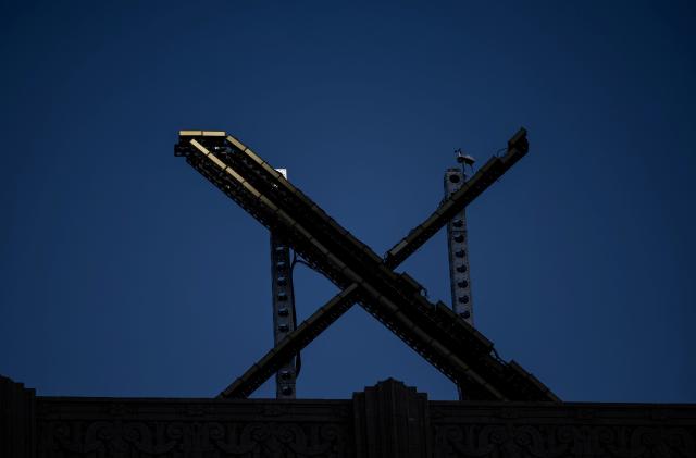 'X' logo is seen on the top of the headquarters of the messaging platform X, formerly known as Twitter, in downtown San Francisco, California, U.S., July 30, 2023. REUTERS/Carlos Barria