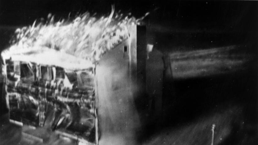 Atom bomb tests in Nevada. The destruction is photographed by a motion picture camera located 60 feet from the doomed house, which is encased in a two inch deep lead sheath.  It shoots 24 frames per second - the time from the first to the last picture (eight were taken) was only 2 1/3 seconds.  The only source of light was the atom bomb. Original Artwork: Image by Edgerton, Getrmeshausen and Grier Inc. for AEC.   (Photo by Keystone/Getty Images)