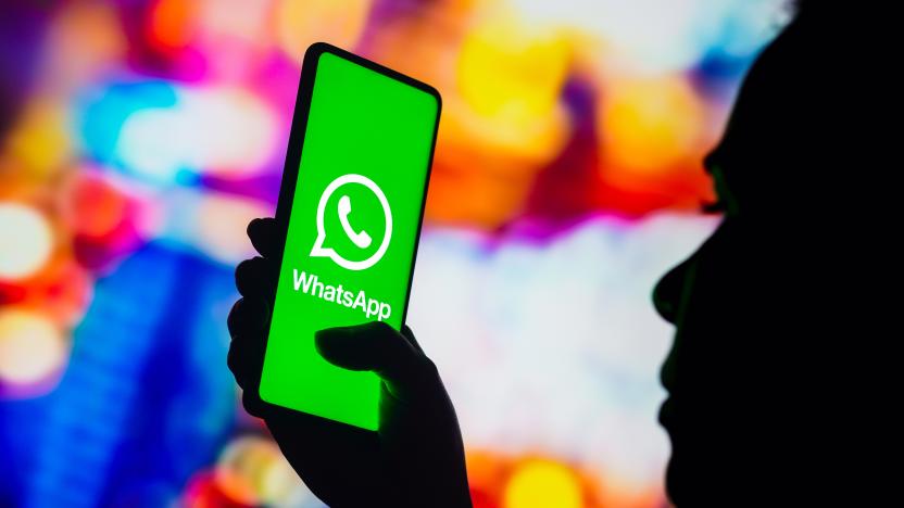 BRAZIL - 2022/10/17: In this photo illustration, a silhouetted woman holds a smartphone with the WhatsApp logo displayed on the screen. (Photo Illustration by Rafael Henrique/SOPA Images/LightRocket via Getty Images)