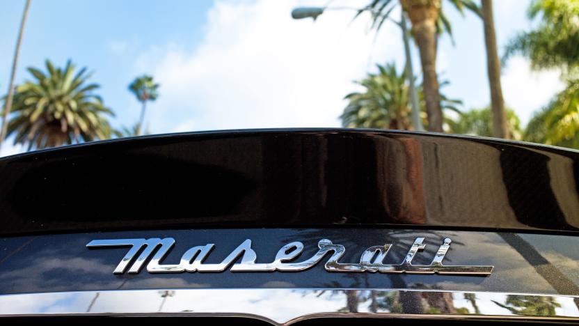 "Beverly Hills, USA - October 21, 2012: A Maserati parked on the streets of Beverly Hills with palm trees and sky" 