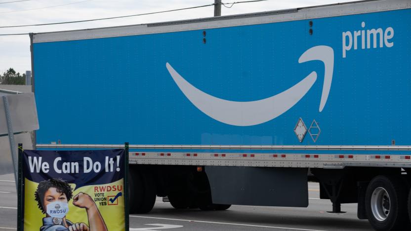 BIRMINGHAM, AL - MARCH 05: A truck passes as Congressional delegates visit the Amazon Fulfillment Center after meeting with workers and organizers involved in the Amazon BHM1 facility unionization effort, represented by the Retail, Wholesale, and Department Store Union on March 5, 2021 in Birmingham, Alabama. Workers at Amazon facility currently make $15 an hour, however they feel that their requests for less strict work mandates are not being heard by management. (Photo by Megan Varner/Getty Images)