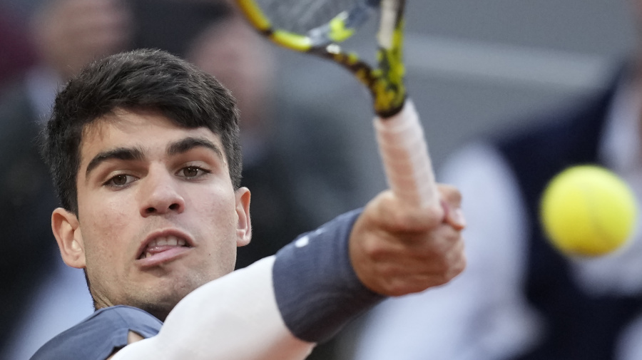 Associated Press - Spain's Carlos Alcaraz plays a shot against Greece's Stefanos Tsitsipas during their quarterfinal match of the French Open tennis tournament at the Roland Garros stadium in Paris, Tuesday, June 4, 2024. (AP Photo/Christophe Ena)