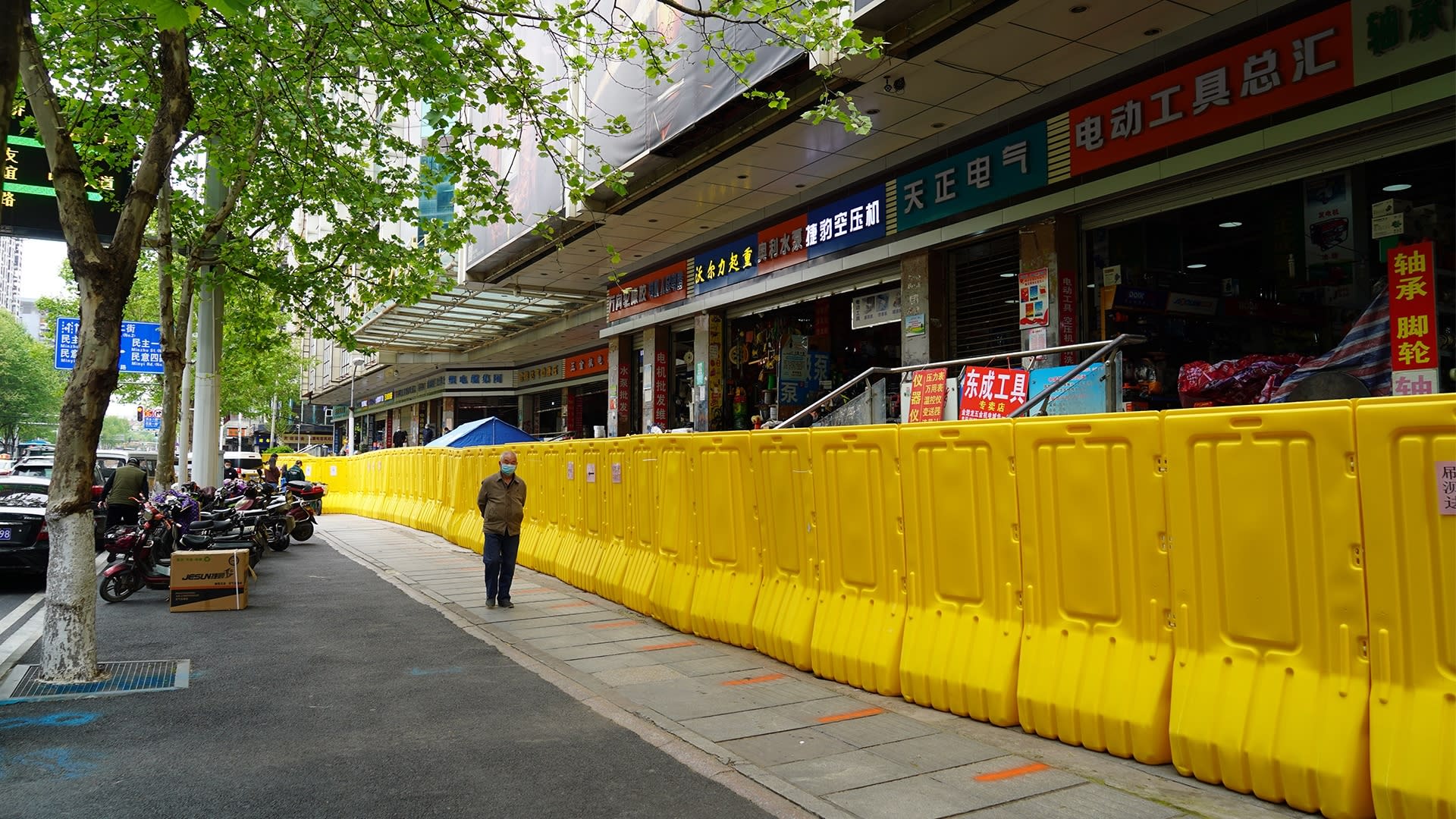 Coronavirus: Wuhan businesses say street barriers must go as Chinese